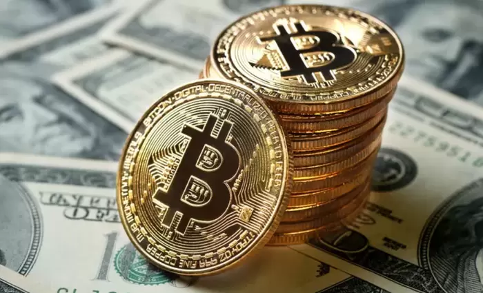 Υποχωρεί το δολάριο, κερδίζει το bitcoin; Πώς Τραμπ και Πάουελ επηρεάζουν τις αγορές